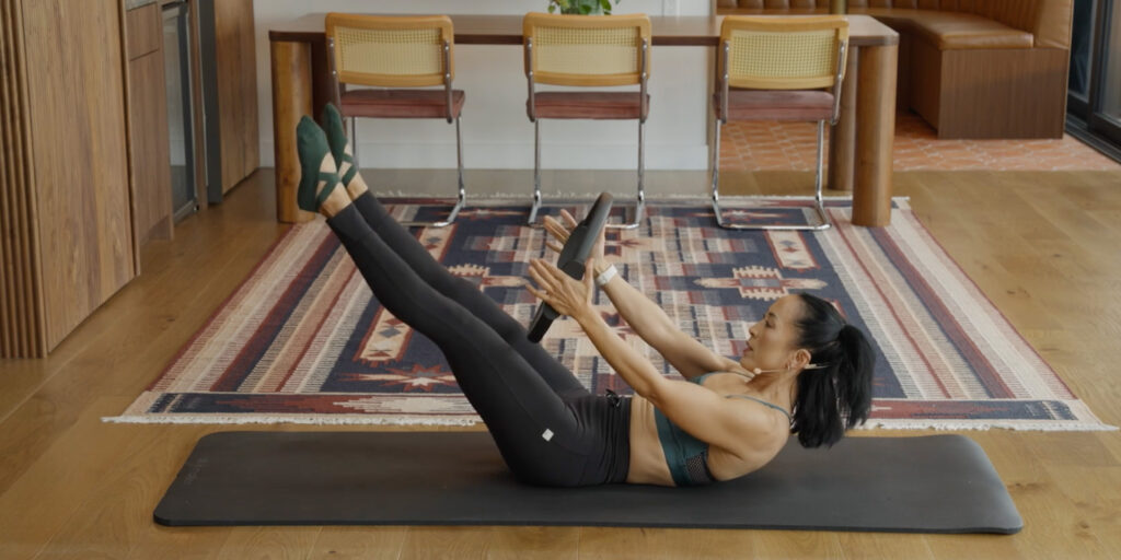 Coach Pearl teaches you Pliates ball and core.